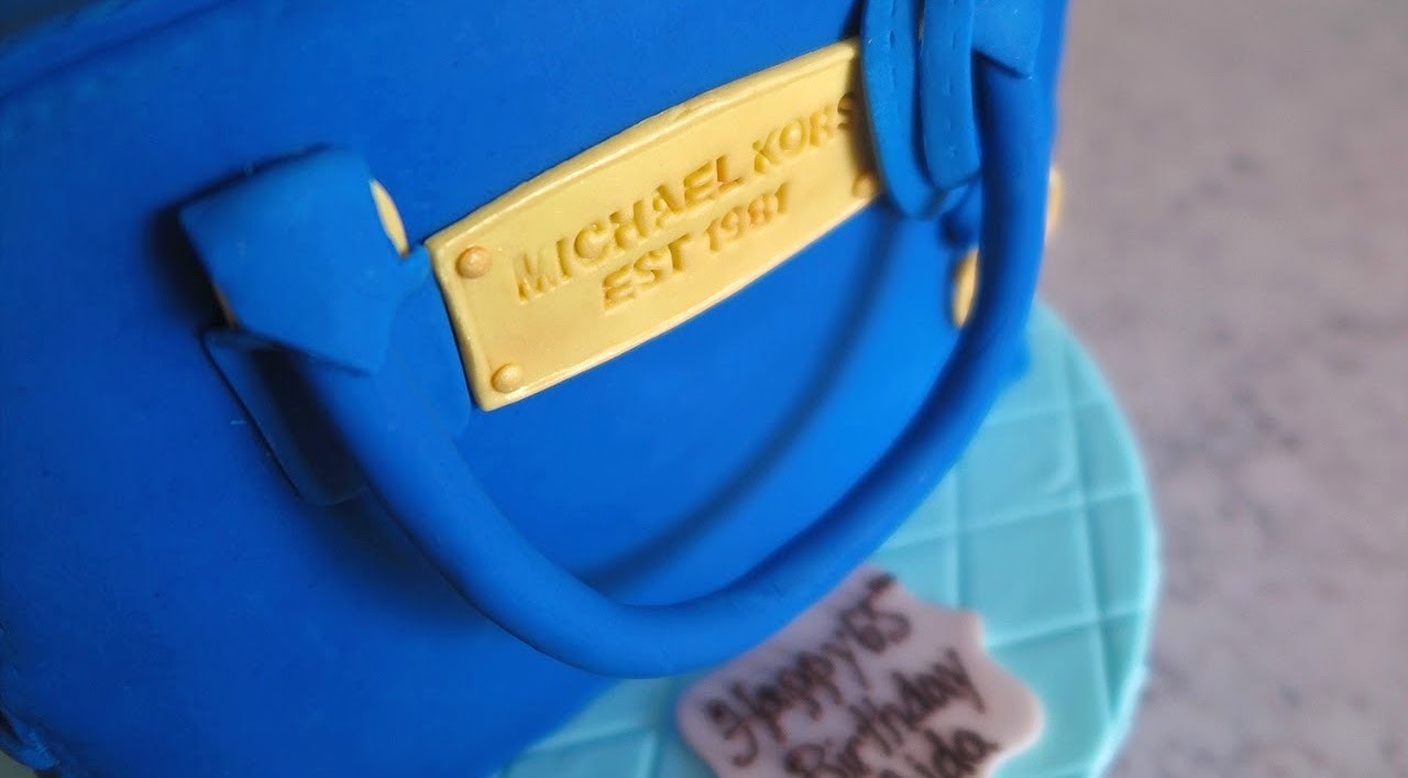 Custom purse wedding cake · Michael Kors Purse Cake