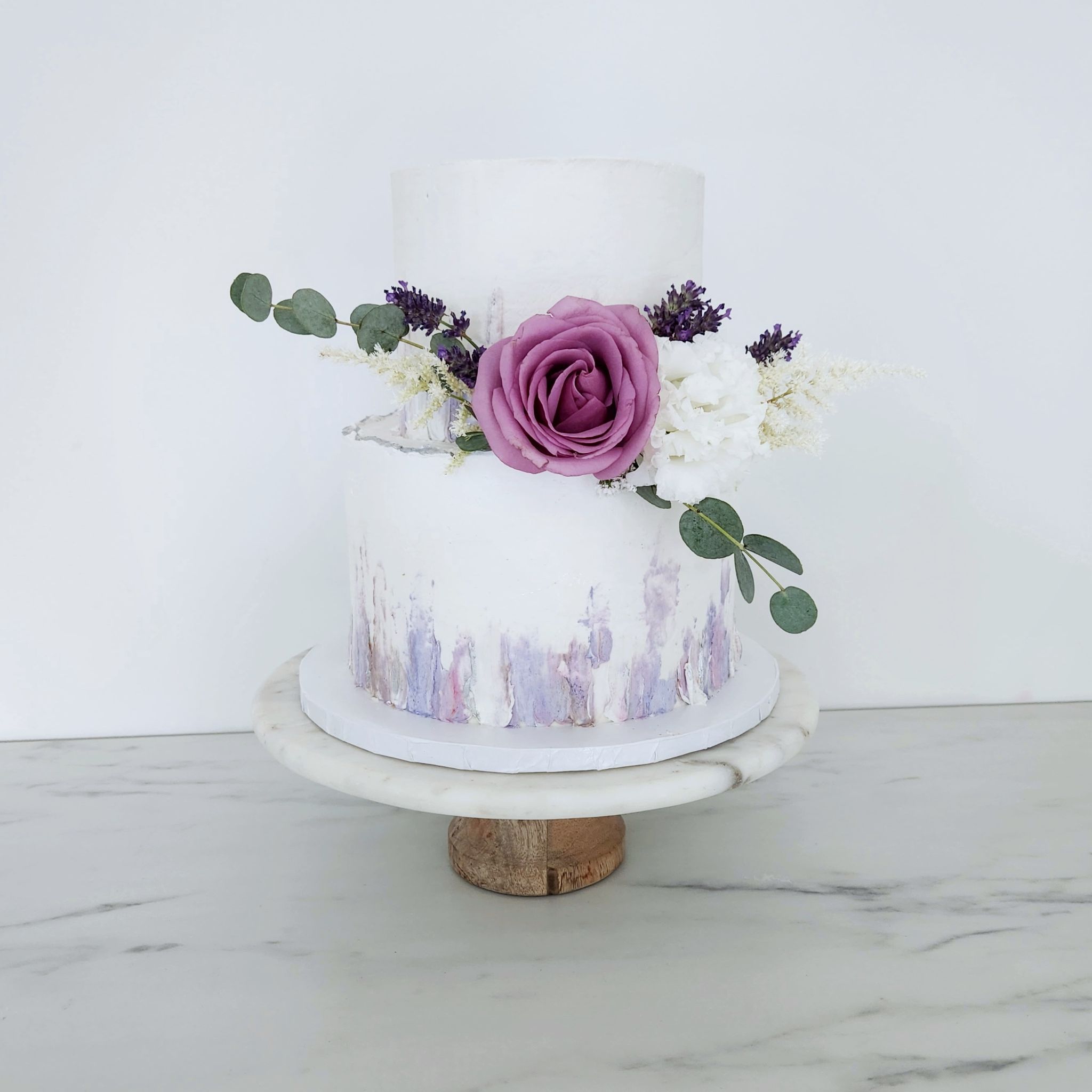Purple two tier wedding cake · Purple two tier wedding cake